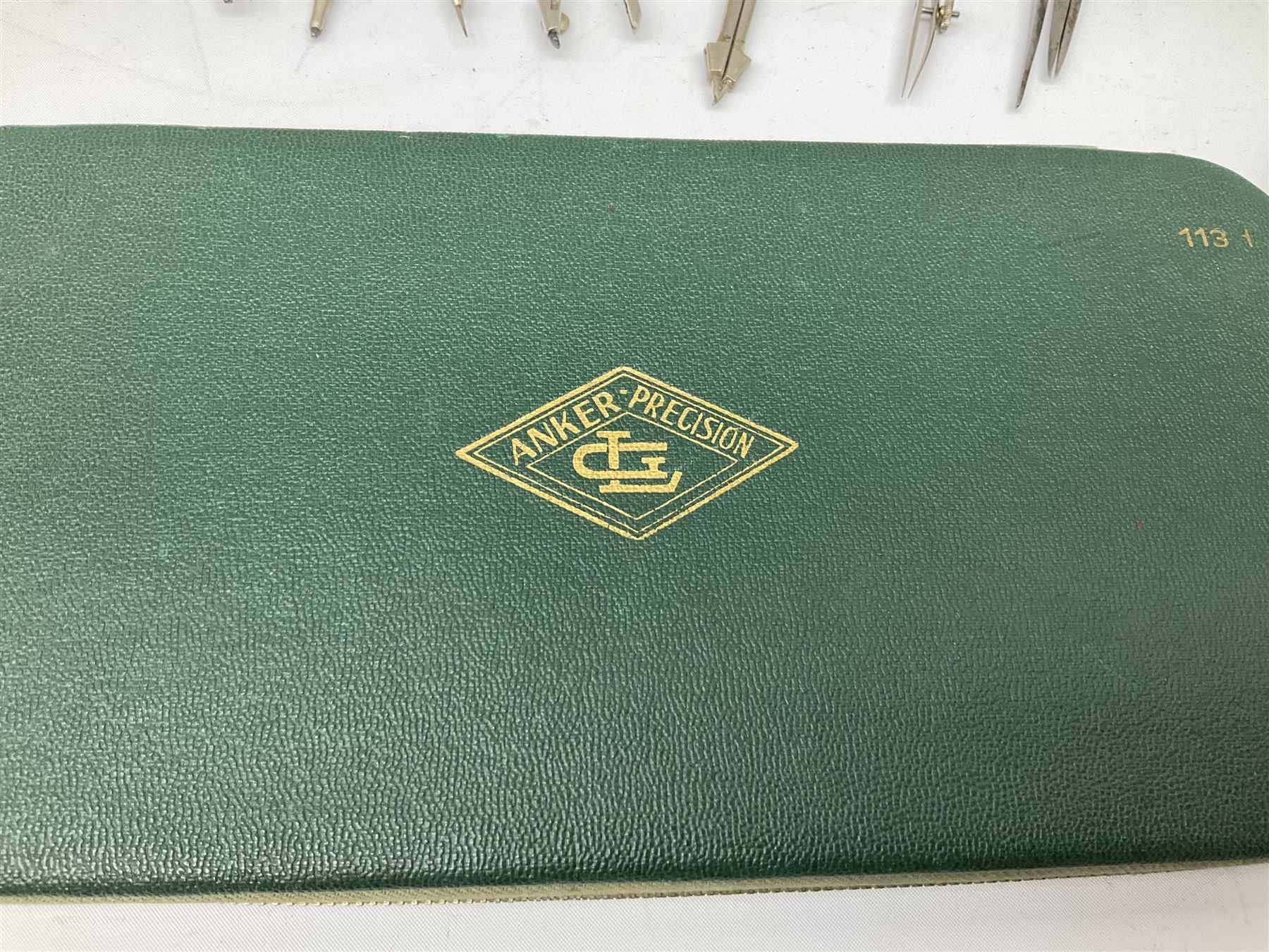 Negretti & Zambra drawing instrument set, the ruler with manuscript name 'F/Sgt. F. Hamilton R.A.F. 194(?)', cased; four other drawing instrument sets by Anker-Precision Germany, EcoBra, Temple etc, all cased; and quantity of loose drawing instruments