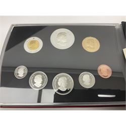 Queen Elizabeth II The Royal Canadian Mint 2006 silver proof dollar and two 2006 proof sets of Canadian coinage, all cased with certificates 