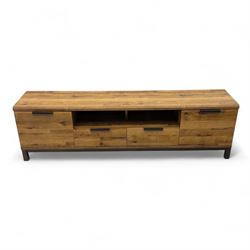 Pair of contemporary media sideboards, oak effect construction with inset handles, comprising two drawers and an open shelf flanked by cupboard doors, on metal supports (2)