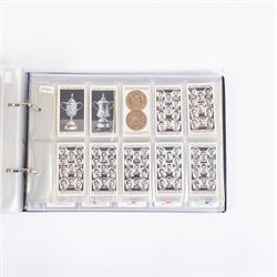 Collection of Edwardian and later Football related trading and cigarette cards, including forty-nine of fifty 1906 Ogden's Football Club Colours, 1922 PALS Footall series, ninety of one hundred 1925 Gallaher Famous Footballers, complete set of forty-four 1926 Ogden's Captains of Association Football Clubs and Colours, complete set of fifty 1927 Players Football Caricatures by MAC,  complete set of fifty 1927 Players Football Caricatures by RIP,  complete set of fifty 1930 Players Association Cup Winners, complete set of 50 1933 Ogdens AFC Nicknames etc, housed in brown cigarette card album