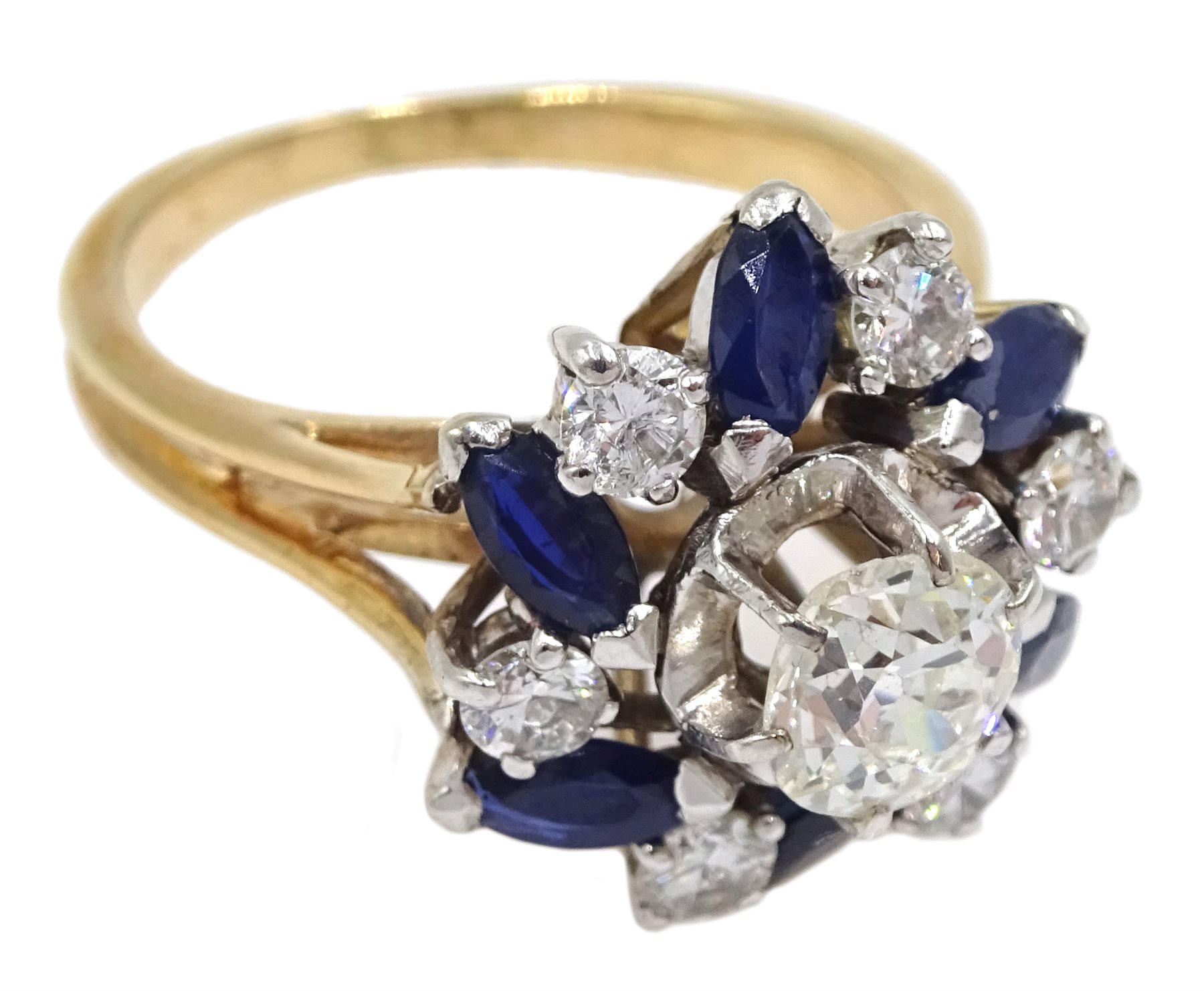 18ct gold diamond and sapphire ring, the central old cut diamond of approx 0.75 carat, with round brilliant cut diamonds and marquise cut sapphires