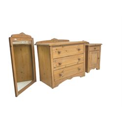 Washed pine three drawer chest (W86cm, H78cm, D48cm), bedside fitted with drawer and cupboard (W50cm, H70cm, D38cm), and matching wall mirror (55cm x 86cm)