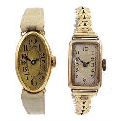 18ct gold oval ladies manual wind wristwatch, London import marks 1924, on cream leather strap and a 9ct gold manual wind wristwatch, on gilt strap