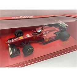 Four Paul's Model Art 1:18 scale Michael Schumacher Collection die-cast racing cars - Ferrari F310B; Ferrari F310/2; Benneton Renault B195; and Ferrari F300; all boxed (4)