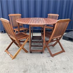 Hardwood drop leaf garden table on castors and folding chairs - THIS LOT IS TO BE COLLECTED BY APPOINTMENT FROM DUGGLEBY STORAGE, GREAT HILL, EASTFIELD, SCARBOROUGH, YO11 3TX
