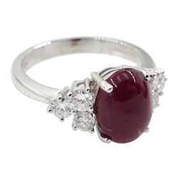 18ct white gold cabochon ruby and six brilliant cut diamond ring, hallmarked, ruby approx 3.70 carat, total diamond weight approx 0.55 carat