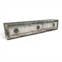 Early Victorian lead-fronted window box planter, of rectangular form with moulded borders and three applied flowerhead roundels, in distressed green finish