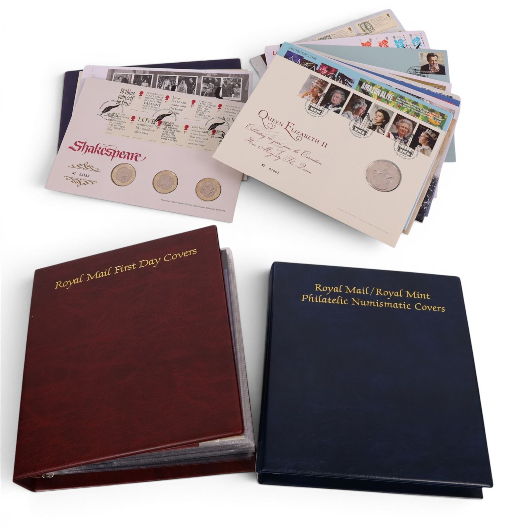 Approximately 79 Royal Mail Royal Mint coin or medallion covers, including 2016 'Shakespeare' three coin cover, housed in two Royal Mail ring binder folders and loose