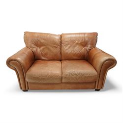 Two-seat hardwood-framed sofa, traditional shape with rolled arms, upholstered in tan leather, on block feet