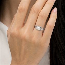 14ct white gold pearl and diamond three stone ring, single cultured white / cream pearl with a single cut diamond set either side, stamped 585