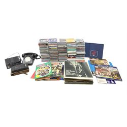 Quantity of predominantly rock and pop CDs, together with vinyl LPs, Kodak camera in case, rotary phone etc