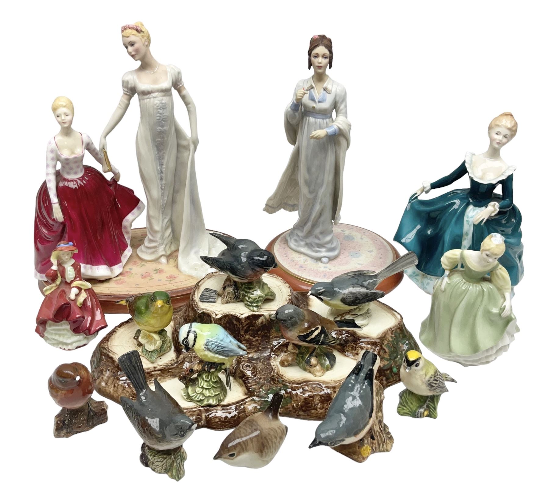 Nine Beswick bird figures, with stand, together with USSR thrush, two Franklin Mint Jane Austin figures and four Royal Doulton figures 