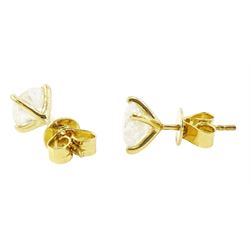 Pair of 18ct gold diamond earrings, each stud set with a single round brilliant cut diamond in a four claw setting, total diamond weight approx 2.15 carat