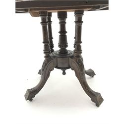 Victorian inlaid walnut oval loo table, five turned columns on carved shaped supports