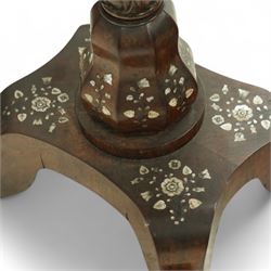 Victorian Mother-of-pearl inlaid rosewood work table, octagonal top inlaid with silvered brass and mother-of-pearl trailing branches of acorn, leaf, and flowering bud decoration, bombe shaped apron with mother-of-pearl leaf inlaid escutcheon, hinged lid with folding mirror, and interior with six lidded compartments and hinged pin cushion above acanthus carved and inlaid pedestal on quattro form base with scroll legs