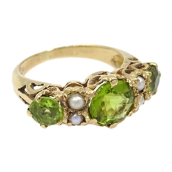  Gold three stone peridot and split seed pearl ring, stamped 9ct  