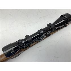 Weihrauch HW100 .22 calibre PCP repeating air rifle; walnut thumbhole stock with textured pistol-grip; Nikko Stirling Silver Crown 3-9x40 telescopic sight; integral sound moderator; No.1901181 L99cm overall; in gun sling; with Logun Combi-Pump and quantity of pellets