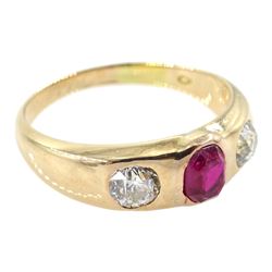 Early 20th century Austrian 14ct gold, gypsy set three stone oval ruby and old round cut diamond ring, hallmarked, total diamond weight approx 0.60 carat