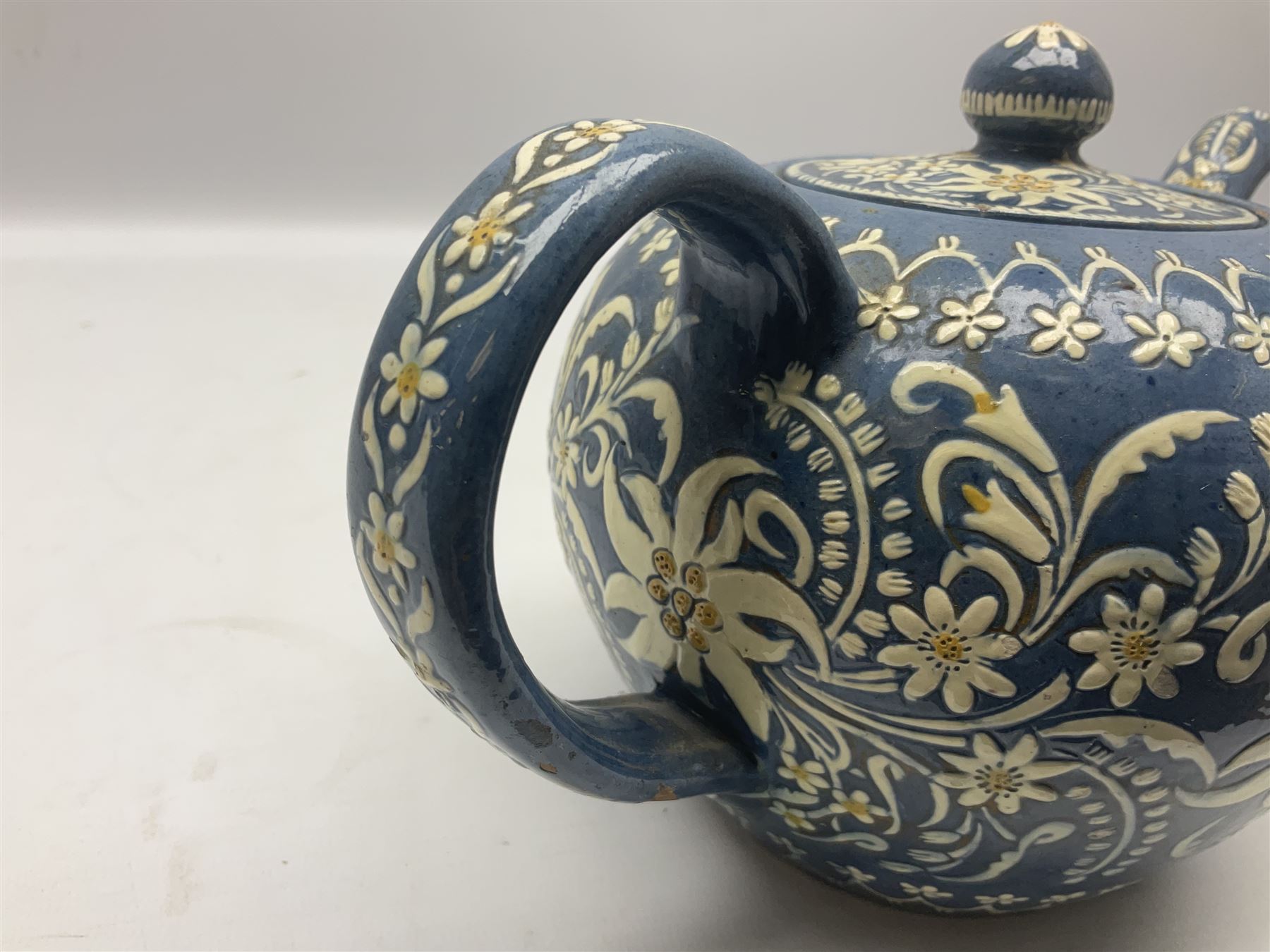 Swiss Thun pottery teapot and cover, decorated with edelweiss flowers, H16cm