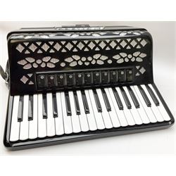Italian E. Soprani piano accordion in black and silver case, twenty keys and seventy-two buttons L41cm; in soft carrying case