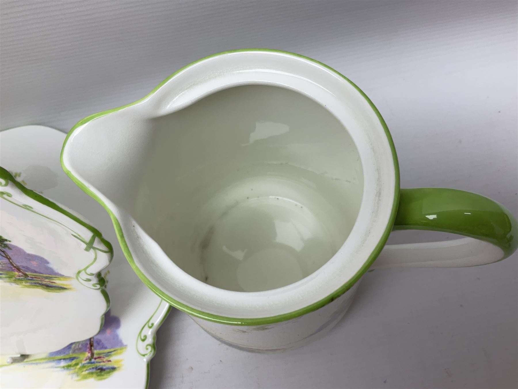 Aynsley Bluebell Time 'As Supplied to the Queen' tea service, comprising hot water jug, six teacups and saucers, milk jug, two cake plates and tow trinket dishes  