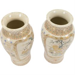 Pair of Japanese Satsuma vases, of baluster form, the panels decorated with immortals and children in a garden, H24cm 