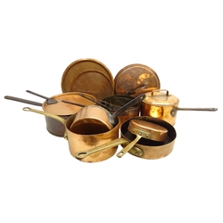  Victorian and later copper cooking pans, including a set of three graduating pans, two stamped by Leon Jaeggi & Sons with matching lids, D30cm max   