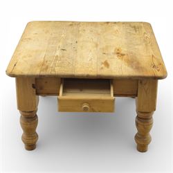 20th century stripped pine coffee table, square top over two frieze drawers, raised on block and turned supports