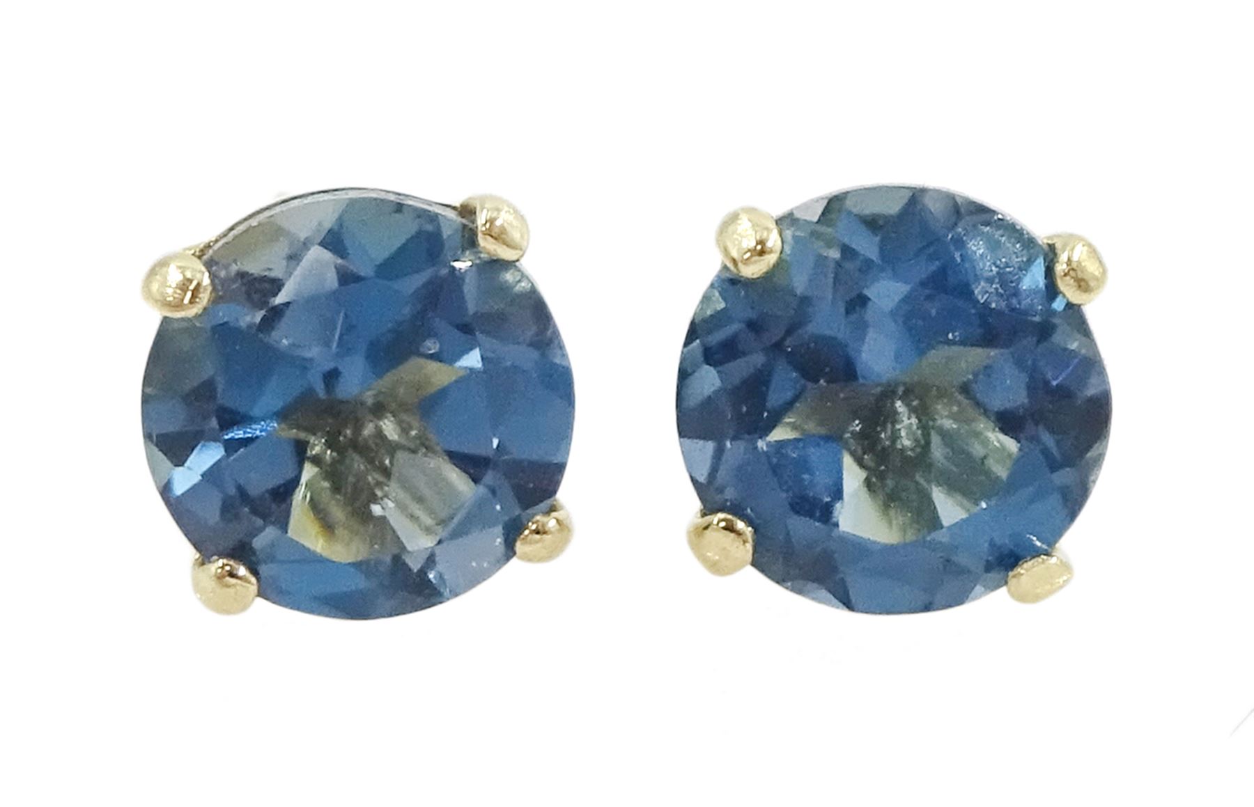 Pair of 9ct gold London blue topaz stud earrings, stamped