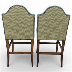 Pair of padded back high seat bar stools, upholstered in cream chevron fabric with green velvet trim 
