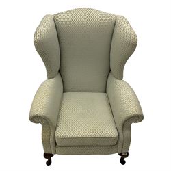 Wing back upholstered armchair