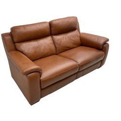 Two-seat electric reclining 'smart' sofa (W192cm, H99cm, D99cm);  two matching armchairs (W101cm); upholstered in stitched tan leather, each unit fitted with USB 