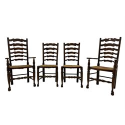 Set of four quality elm ladder back dining chairs, comprising two carver armchairs and two side chairs, with rush seats