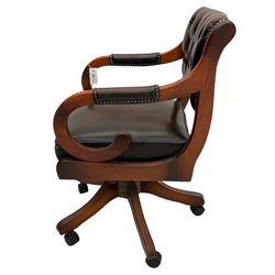 Stained beech swivel office desk chair, scrolled arm supports, upholstered in buttoned leather