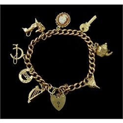 9ct rose gold curb link bracelet, with eight 9ct gold charms including fox head, good luck horseshoe, key, harp, kettle and dachshund