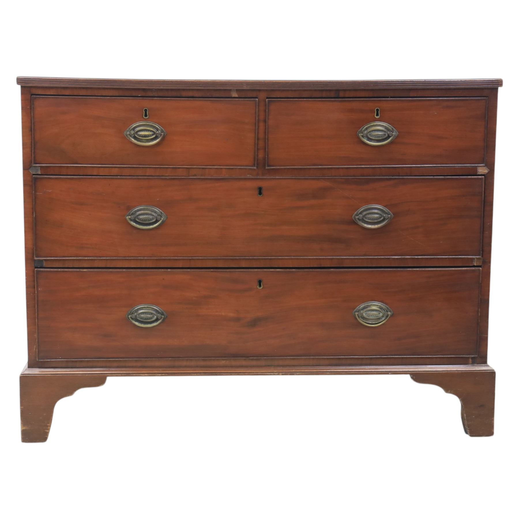 Early 19th century mahogany chest, fitted with short and two long drawers, crossbanded top, raised on bracket feet