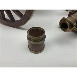 Large model brass cannon, upon wooden base, together with two similar smaller cannons, largest L48cm