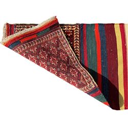 Southwest Persian Qashqai saddle bag, red and ivory ground with diamond-shaped star motifs in the top and bottom panels, central field decorated with alternating horizontal stripes
