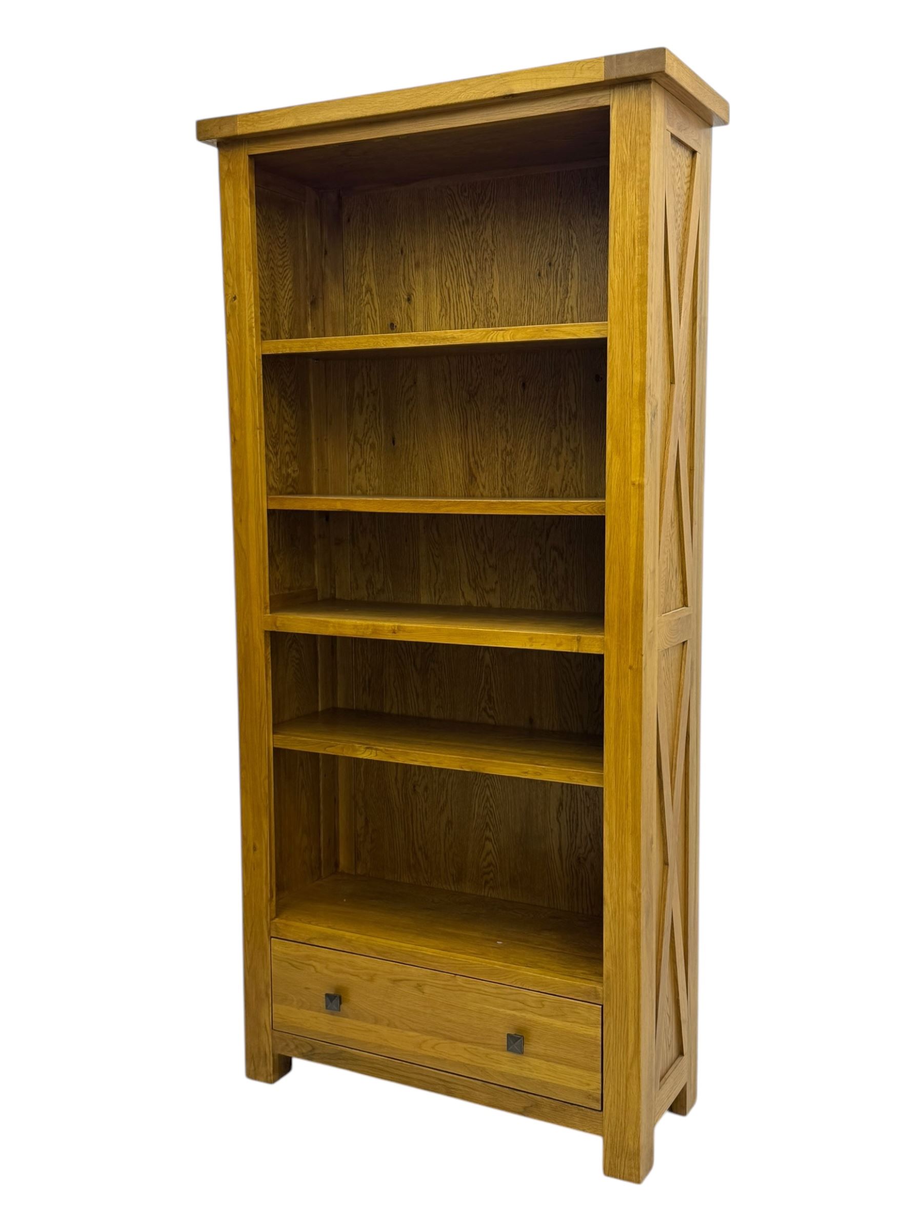 Oak Furnitureland, golden oak open bookcase fitted with single drawer
