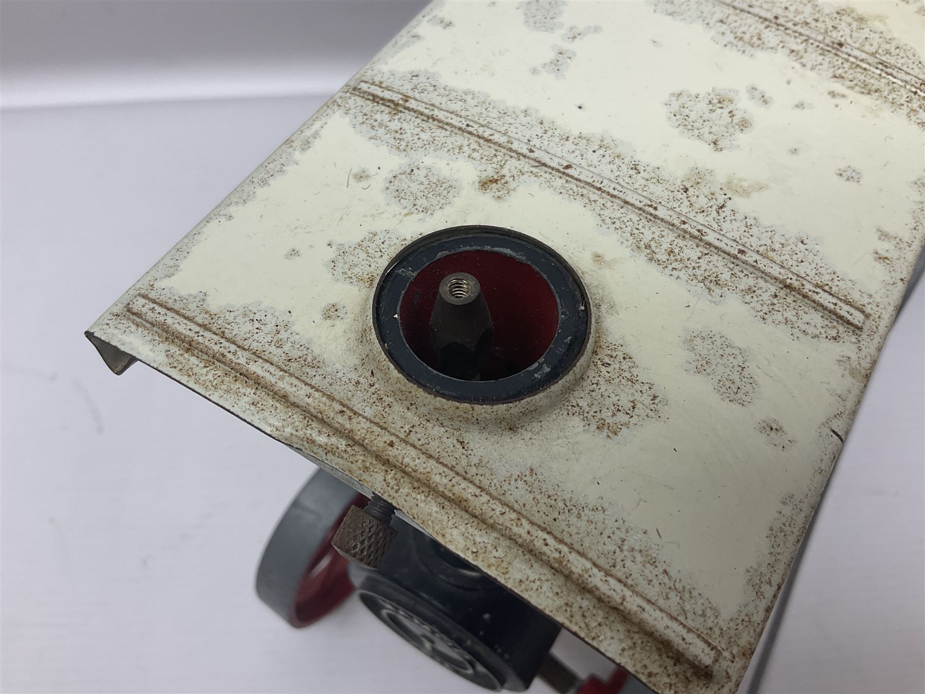 Mamod TE1a steam traction engine with burner, bunker, steering rod and funnel; red and black painted Tri-ang tin-plate Jones KL44 mobile crane; and two Hull Savings Bank Home Safe money boxes; all unboxed (4)