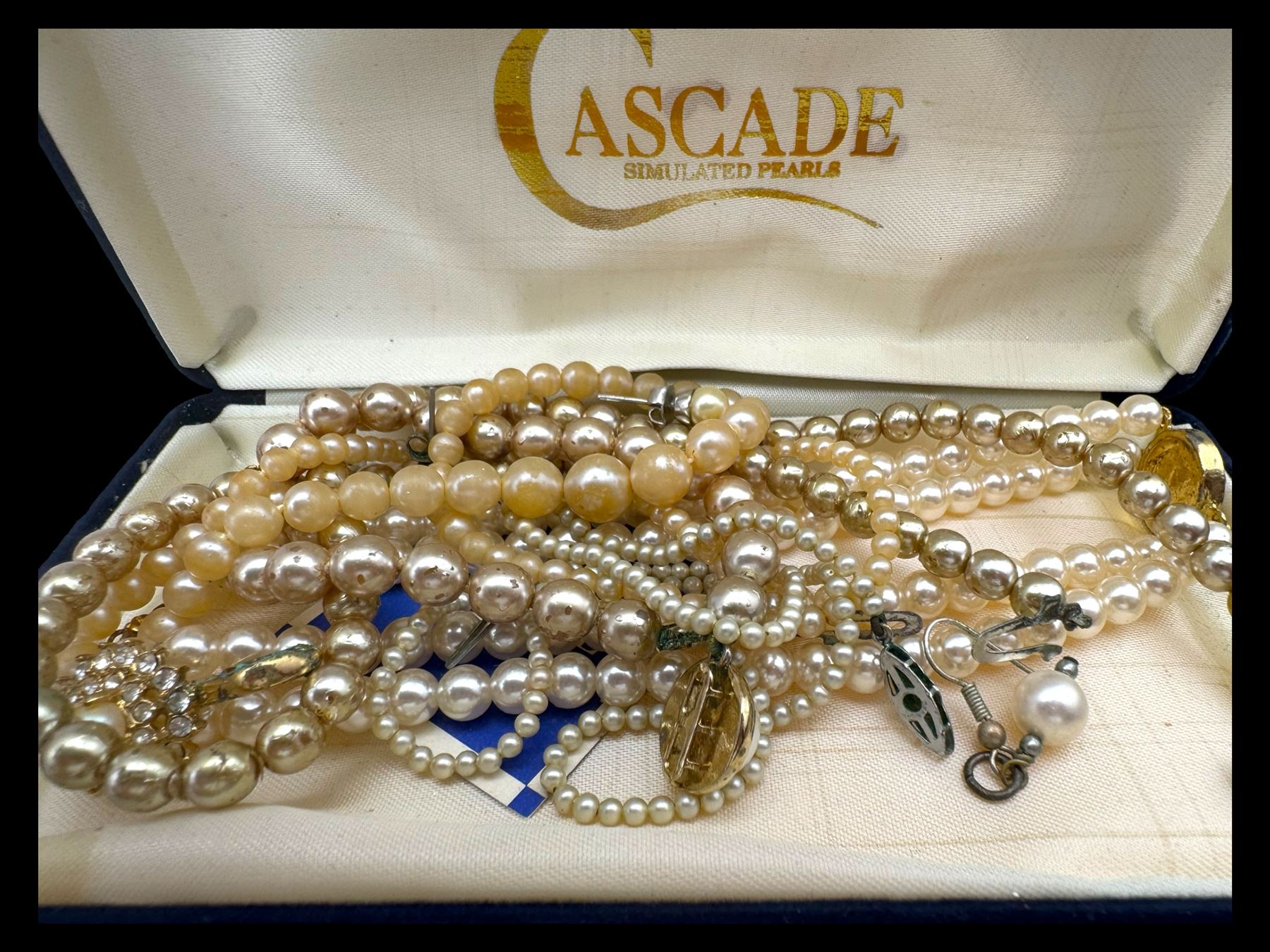 Four pairs of 9ct gold stud earrings, silver stone set stud earrings and a collection of costume jewellery brooches and bead necklaces