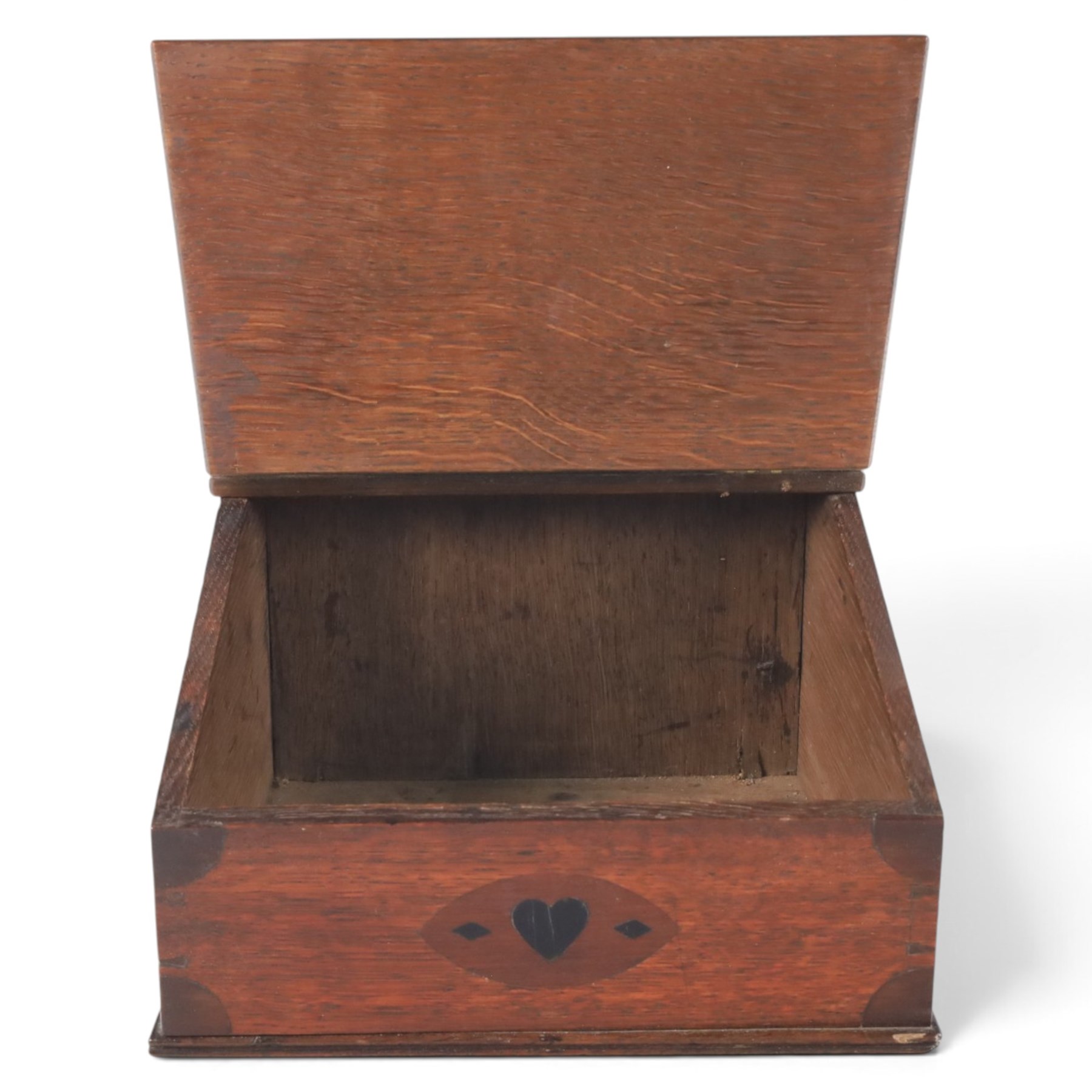 19th oak candle box, of rectangular form with hinged lid, the front with inlaid heart decoration, H25cm  