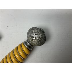 WW2 German Luftwaffe 2nd Pattern Officers dress dagger, with unmarked 25.5cm double edged steel blade, wire-bound pale orange/yellow celluloid grip, globular  pommel with oak leaves and traces of gilding, Luftwaffe eagle cross guard; in beaded scabbard with two suspension rings L43cm overall