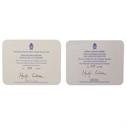 Royal Crown Derby paperweights, Galapagos Penguin limited edition 177/1000 and Madagascan Tortoise 177/1000, both from the Endangered Species series with gold stoppers and certificates