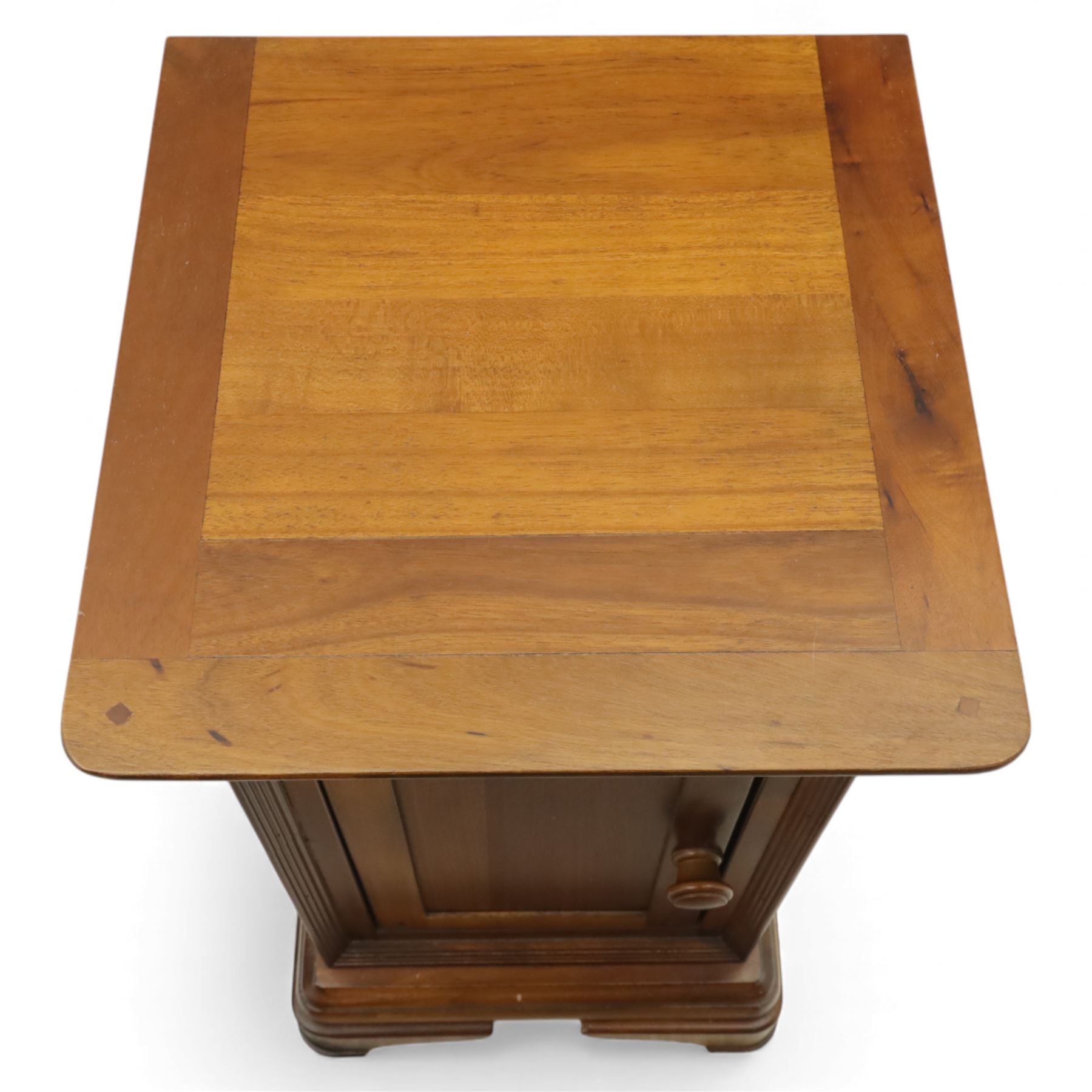 Willis & Gambier - French cherry wood bedside cabinets, each with square moulded top, frieze baize lined drawer and single cupboard door, raised on shaped plinth bases