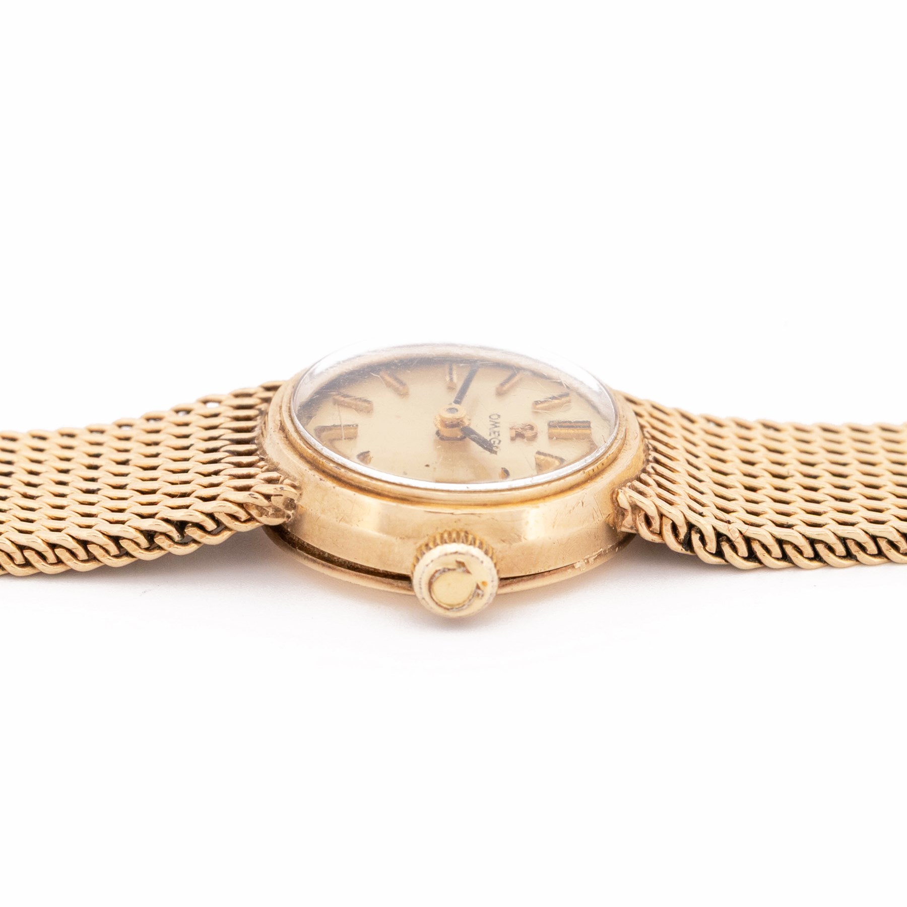 Omega ladies 9ct gold manual wind wristwatch, Cal. 244, white / cream dial with dagger and Arabic hour markers, case by Dennison, Birmingham 1958