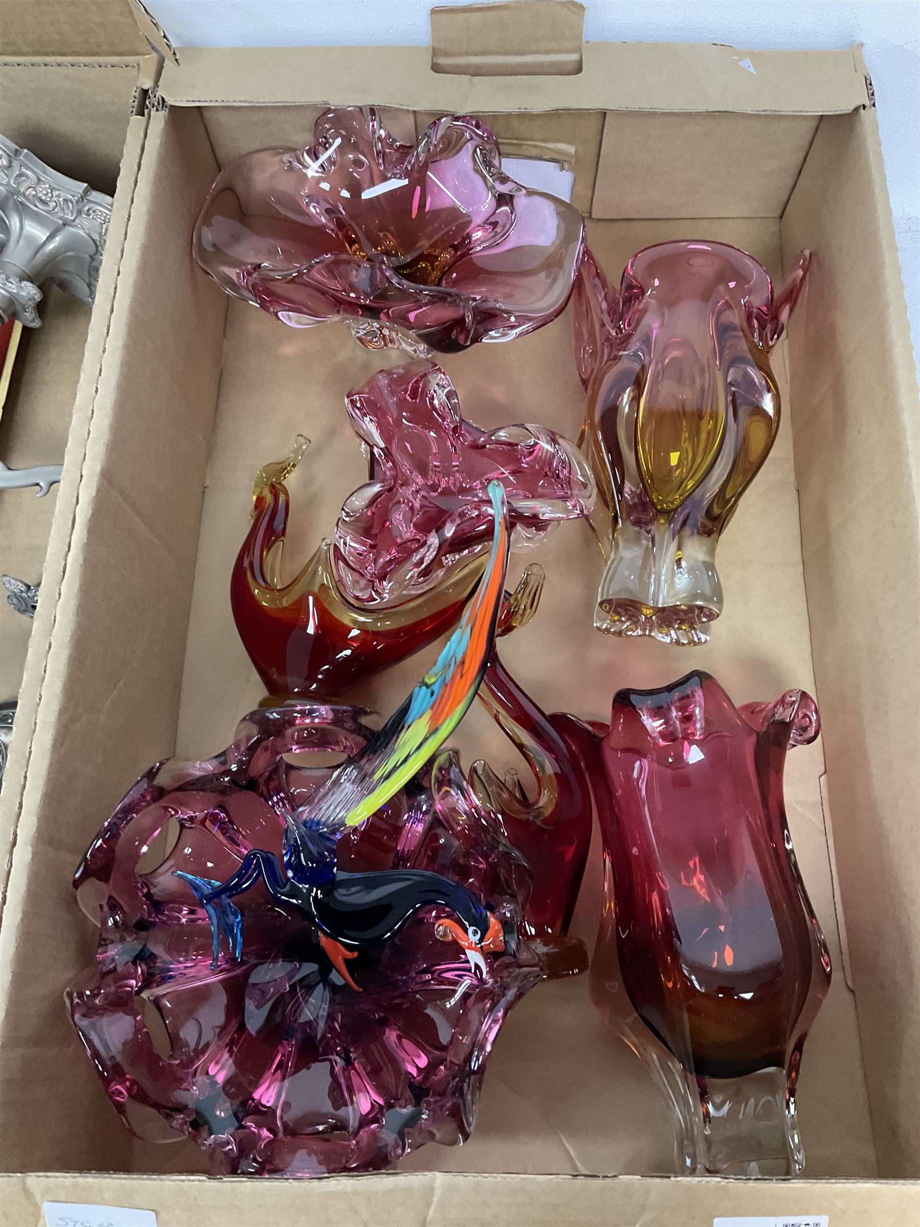 Two silver plated twin branch candelabras and candlestick, together with a coppered effect candlestick, cranberry art glass etc