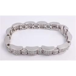  Platinum and diamond pave link bracelet, twelve links of twelve princess cut diamonds alternating with twelve links of six diamonds stamped PLTM  