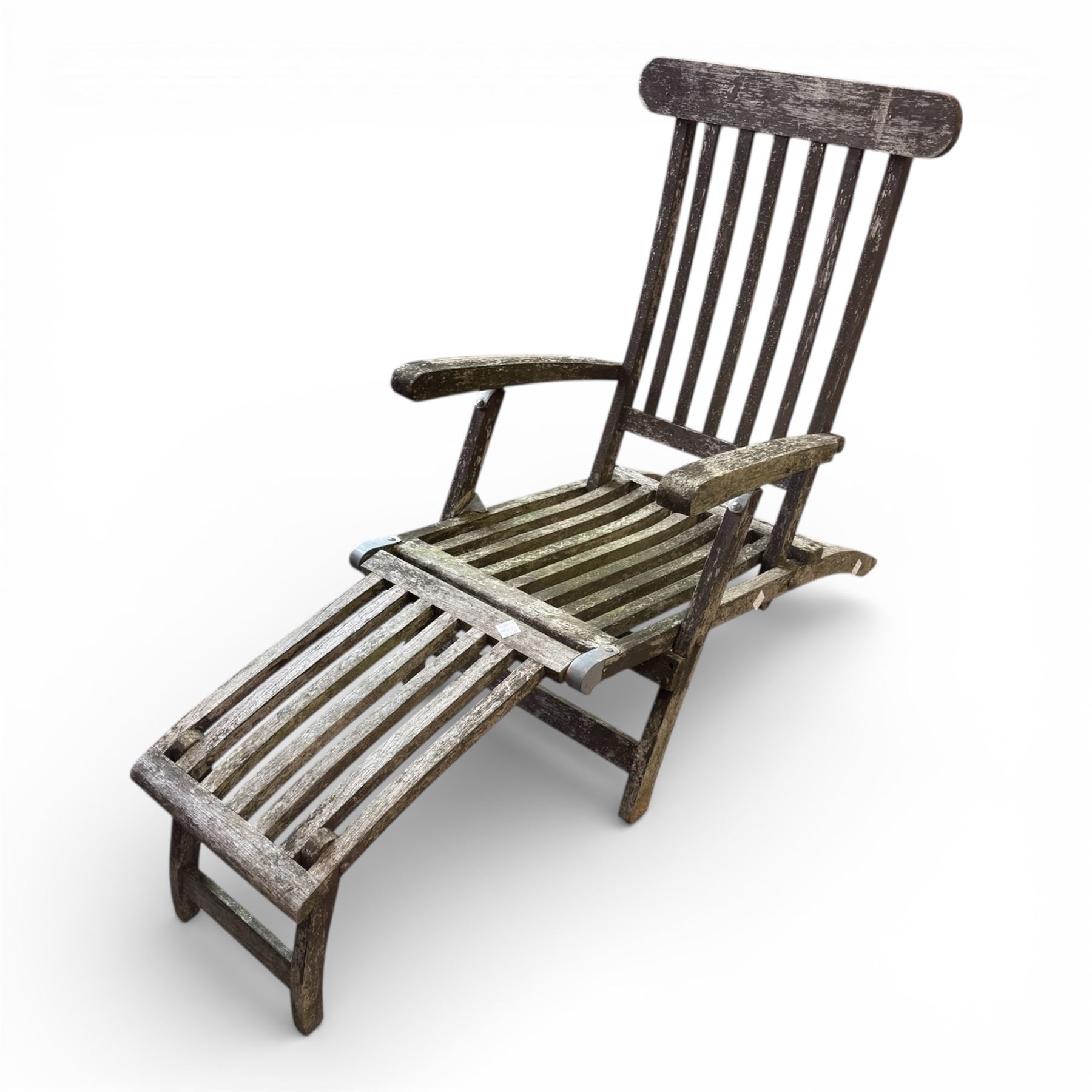 Two teak steamer chairs, one with cushion