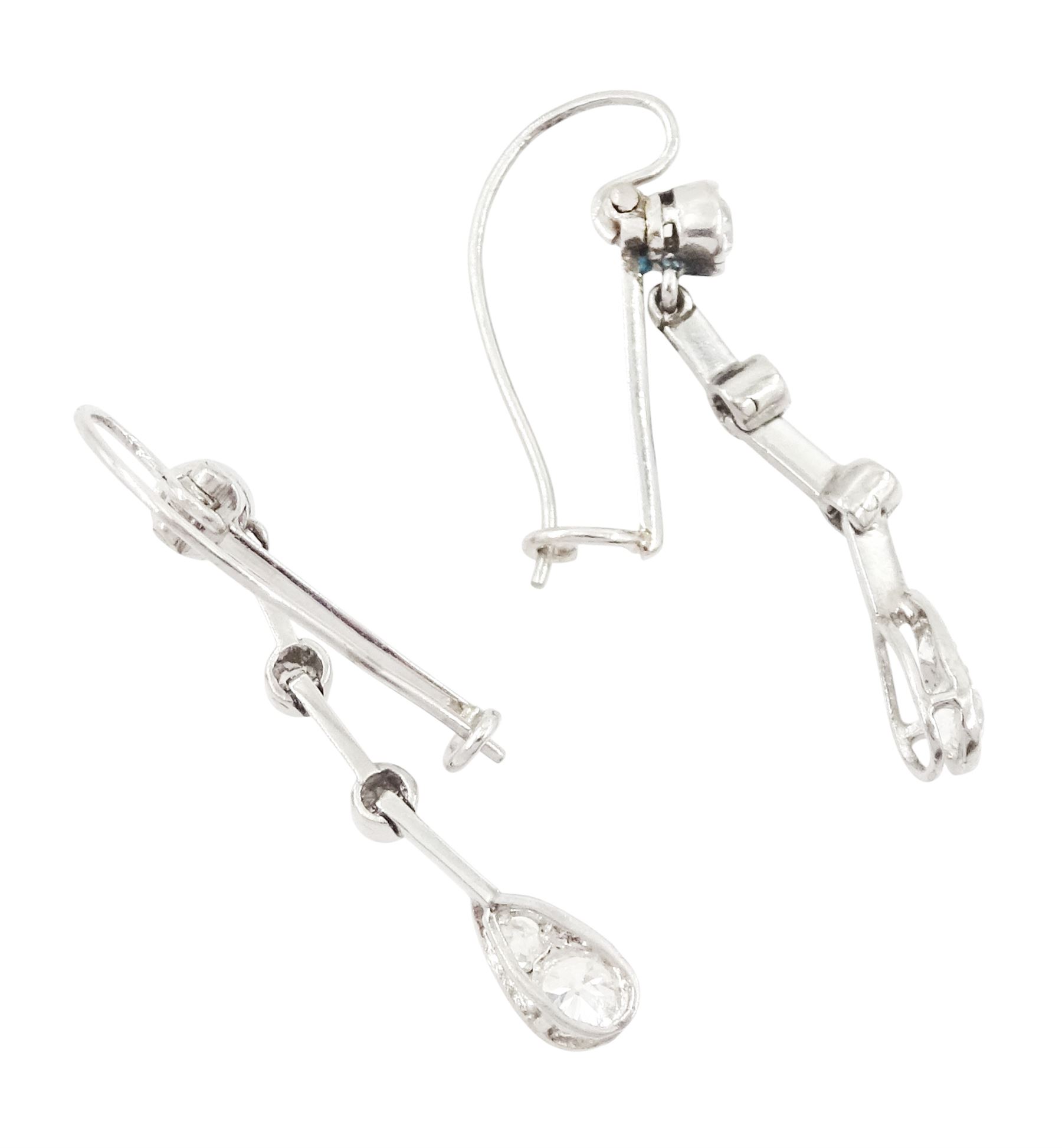 Early 20th century platinum diamond earrings, circa 1930, each pendant milgrain set with old cut diamonds, spaced by knife edge bars, to shepherd's hook back, total diamond weight approx 0.55 carat 